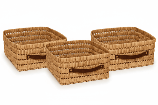 Set of 3 handmade raffia storage boxes with leather handles